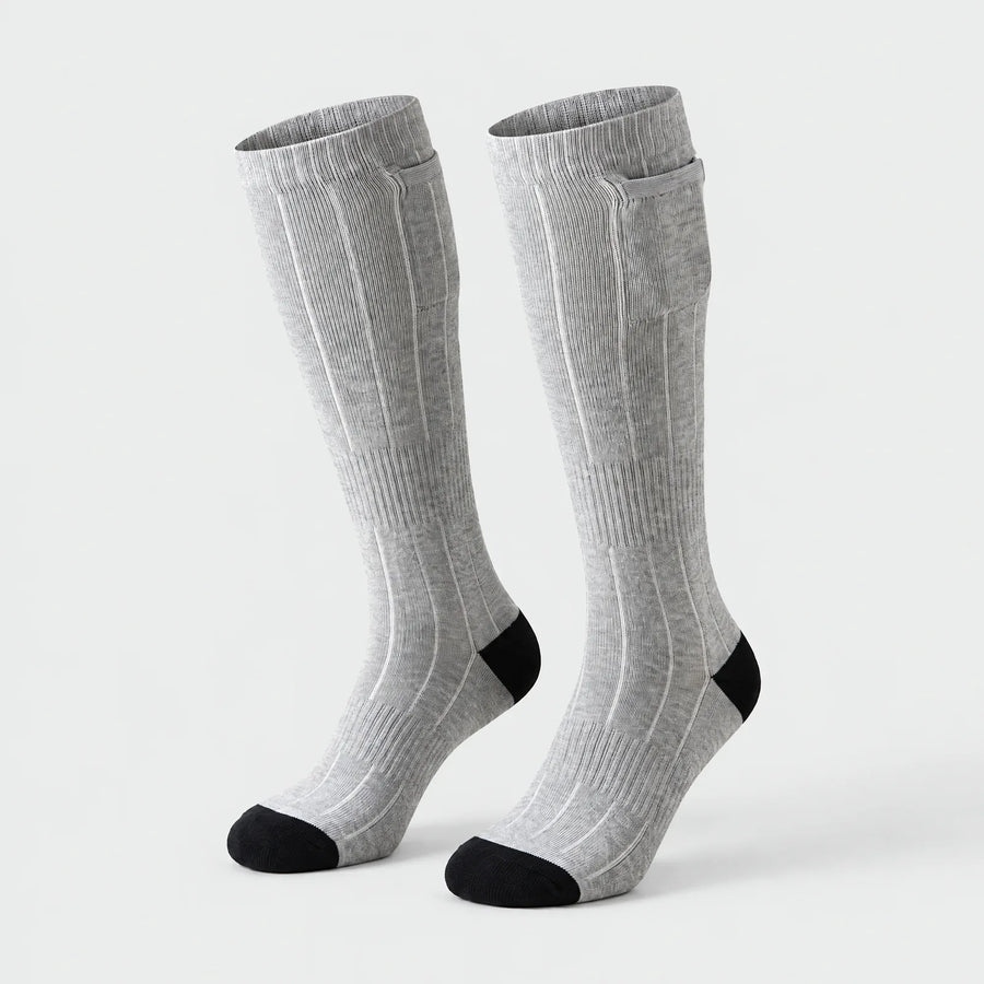 Alpenwarm heated knee-high socks in gray with black heel and battery pocket at the cuff