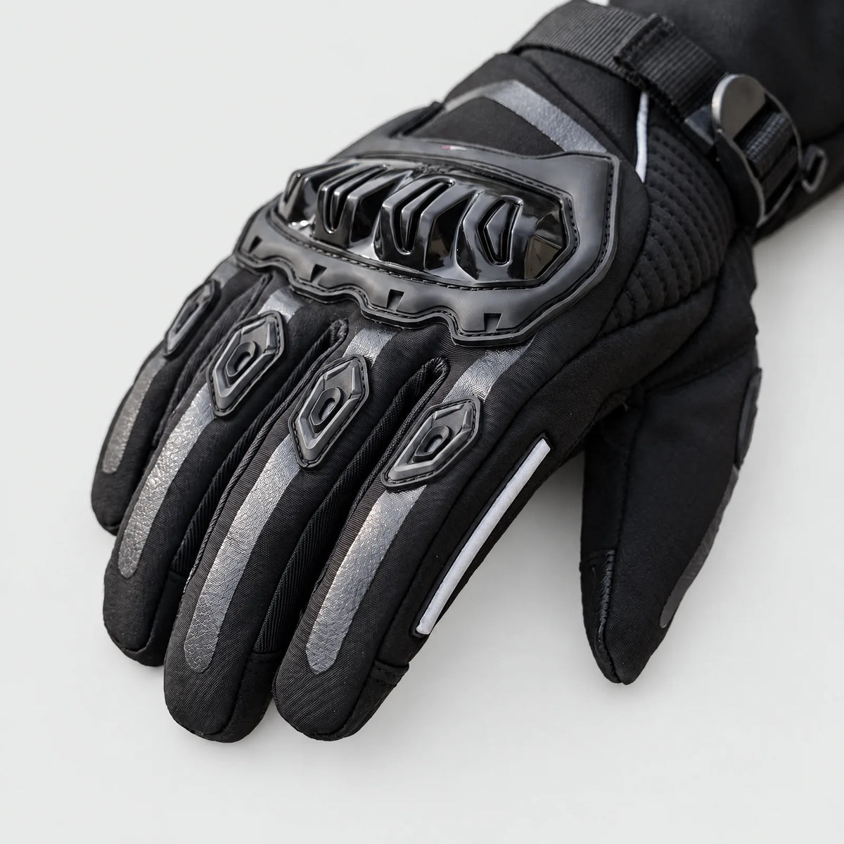 Hard knuckle protection and padded fingers of the winter motorcycle gloves